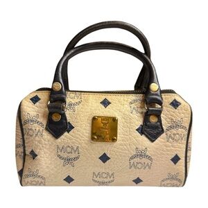 MCM Baby Cream and Navy Mini with Gold Accents